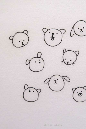 Para desenhar - Desenhos simples de sete rostos de animais diferentes, incluindo ursos, um gato, um cachorro e um coelho, em um fundo branco. Desenhos fáceis de desenhar para todas as idades aproveitarem.