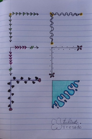 Página de caderno com diversas bordas decorativas e desenhos desenhados ao longo das margens, alguns coloridos com padrões e formas, lembrando uma capa de caderno.