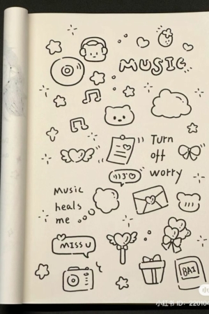 Uma página de caderno caprichosa com rabiscos incluindo notas musicais, gatos, estrelas, nuvens e frases positivas como "Desligue a preocupação" e "A música me cura". É o escape perfeito para aqueles que amam desenhar e abraçam a criatividade diariamente. Para desenhar.